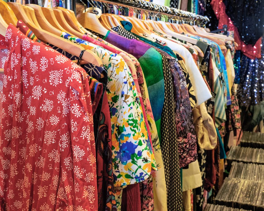 Milan - Italy. Display of brightly colored women's clothes at the flea market