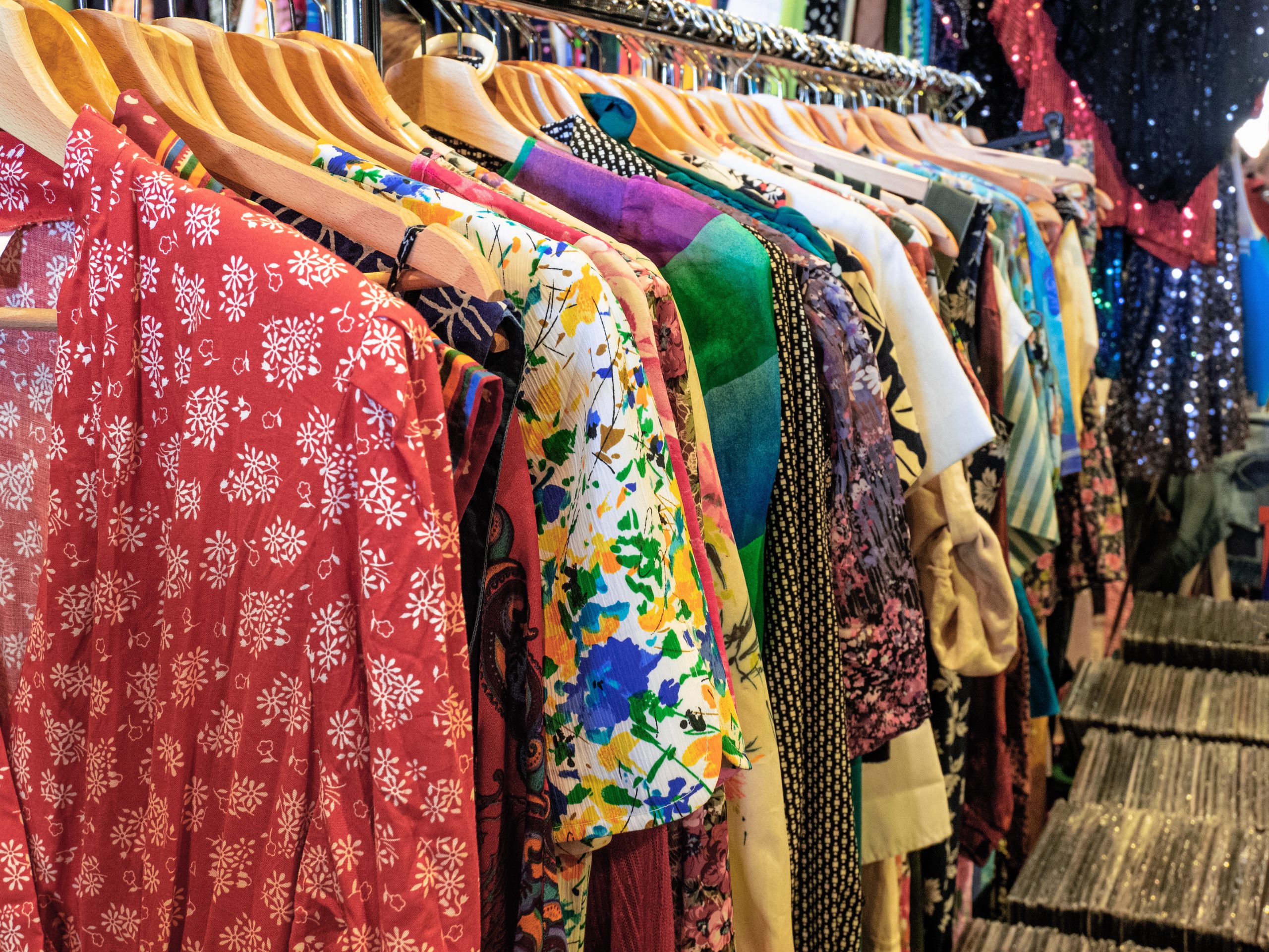 Milan - Italy. Display of brightly colored women's clothes at the flea market